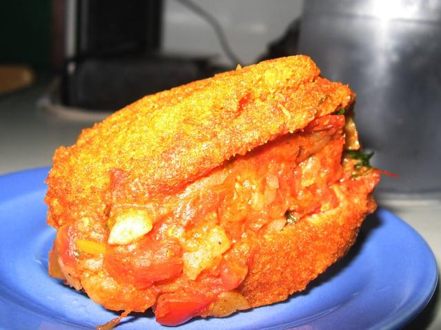 Acarajé is peeled black-eyed peas formed into a ball and then deep-fried.