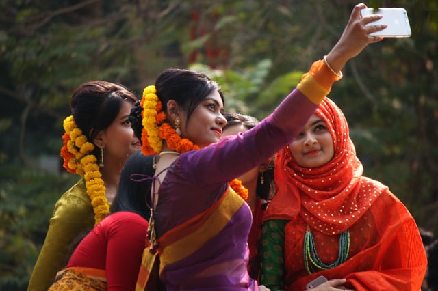 Bangladeshi girls taking group selfie at Pohela Falgun.