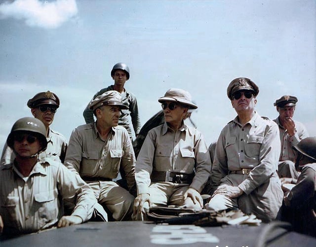 American military officers off Leyte Island in the Philippines, October 1944: Lieutenant General George Kenney, Lieutenant General Richard K. Sutherland, President Sergio Osmeña, General Douglas MacArthur