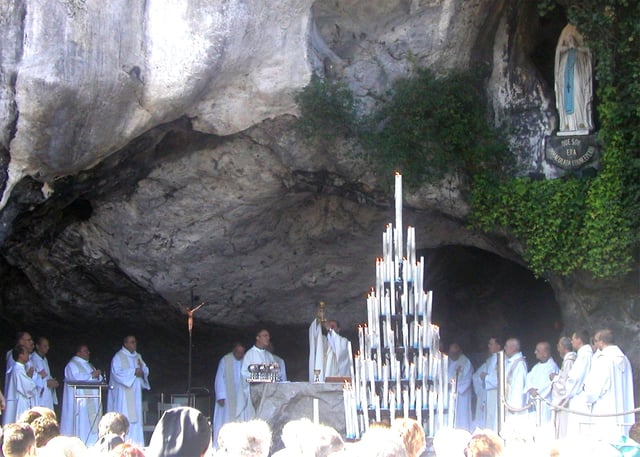 At a celebration of the Eucharist at Lourdes, the chalice is shown to the people immediately after the consecration of the wine.