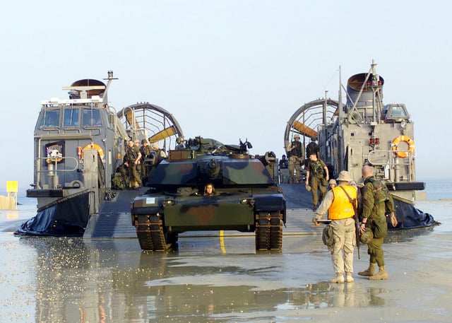 US Marine M1A1 tank is off-loaded from a US Navy LCAC in Kuwait in February 2003