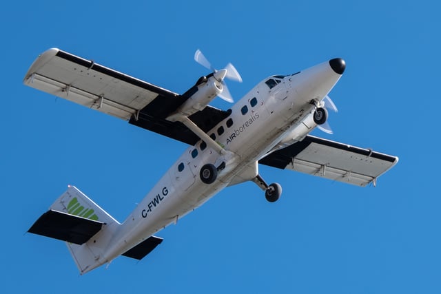Air Borealis (PAL Airlines) DHC-6-300 Twin Otter C-FWLG departs Nain Airport, Labrador Canada in 2017.
