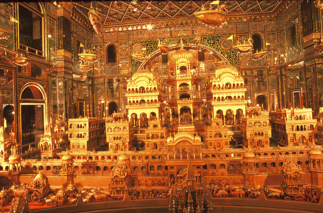 Gold carving depiction of the legendary Ayodhya at the Ajmer Jain temple.