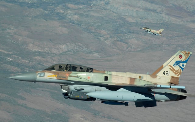An Israeli F-16I (Block 52) with conformal fuel tanks (CFTs), internal/integrated Electronic countermeasures, and other external stores during a Red Flag exercise at Nellis AFB, NV, July 2009