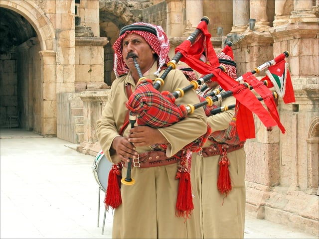 Jordanian folklore band playing bagpipes in Jerash.