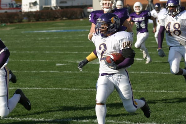 Tim Walker charges towards the end zone on a punt return against Linfield in the NCAA Div III Championship Game