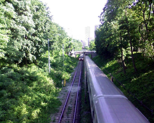 An open cut section looking south to Rosedale station from atop the Rowanwood Portal