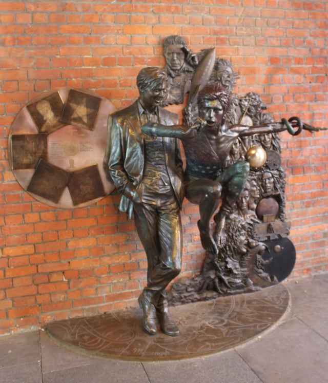 Statue of Bowie in different guises in Aylesbury, Buckinghamshire, the town where he debuted Ziggy Stardust in 1972