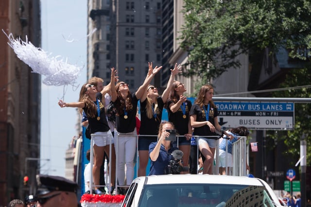 Morgan and teammates during the ticker tape parade in New York City, July 2015