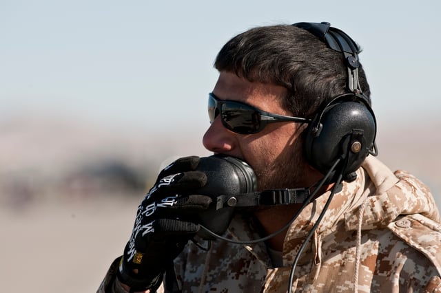 UAEAF crew chief communicating during an engine test at Nellis Air Force Base during Red Flag 11-2 on February 2, 2011.