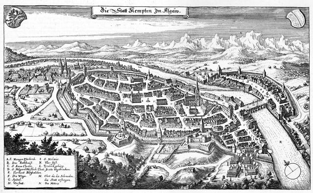 A finely detailed drawing of an old city, with church towers, thick defensive walls, moats, and lots of houses. The Iller river divided the Free Imperial City of Kempten and Kempten Abbey.