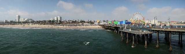 Santa Monica beach and pier viewed from the end of Santa Monica Pier. Note the bluff is highest at the north end, followed by Downtown to the left of the image