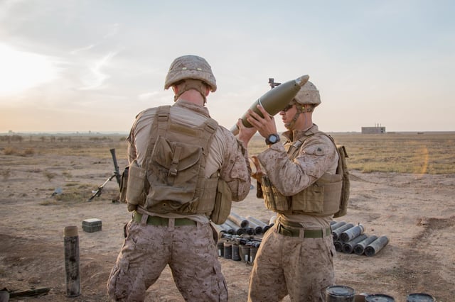 3rd Battalion, 4th Marines loading 120mm mortar rounds during Operation Inherent Resolve in Syria, November 2018