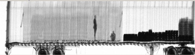 Gamma-ray image of a truck with two stowaways taken with a VACIS (vehicle and container imaging system)