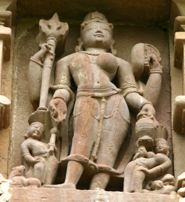 Ardhanarishvara sculpture, Khajuraho, depicting Shiva with goddess Parvati as his equal half. In the Ardhanarisvara concept, the icon is presented as half man and half woman.