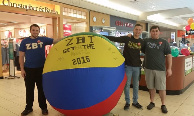 Brothers from Gannon University (Zeta Xi) hosting a "Get on the Ball" event at a shopping mall.