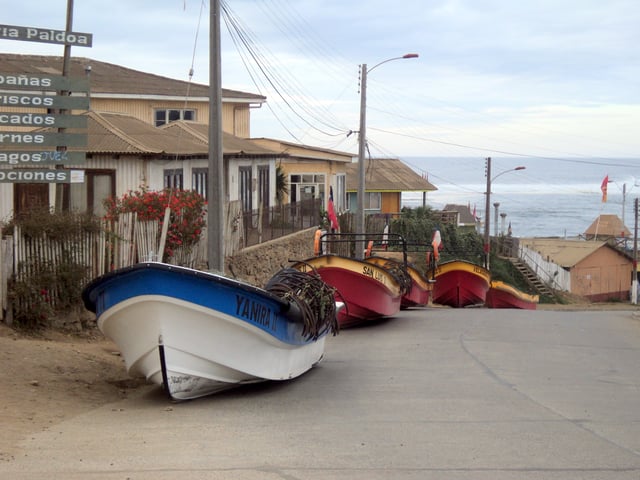 Fishing boats that were moved to higher ground in anticipation of tsunami arrival, in Pichilemu, Chile