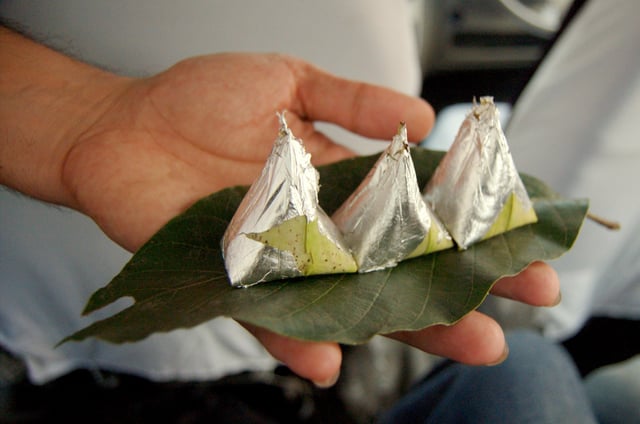 Paan, (betel leaves) being served with silver foil