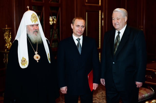Yeltsin with Patriarch Alexy II and Prime Minister Vladimir Putin