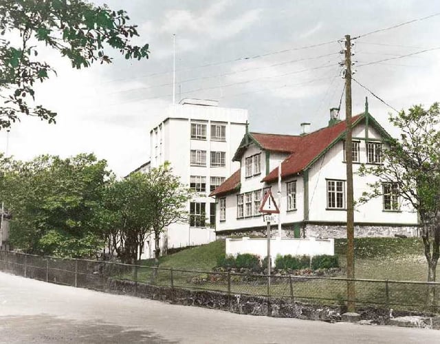Løgting house in the 1950s. The building in the background was from the Faroese telecom and belongs now to the Løgting as administration offices.