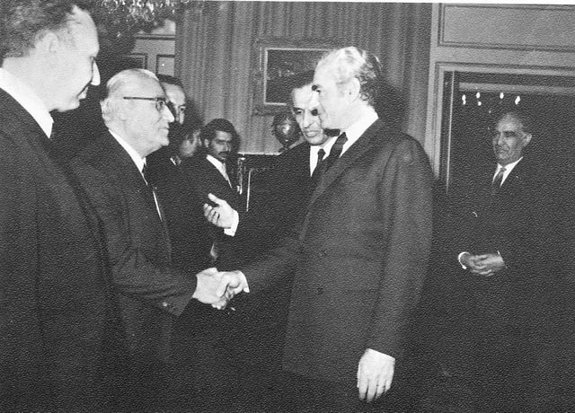 Mohammad Reza shakes hands with members of OPEC in a landmark session in Tehran, 1970