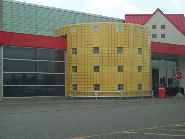 Meijer Yellow "Pineapple" signature design of the mid-1990s Meijer stores: The Yellow Pineapple housed seating for the cafe. Note the translucent wall panels above the yellow area. This picture was taken at the store on North Portage Road in South Bend, Indiana, which opened in 1994.