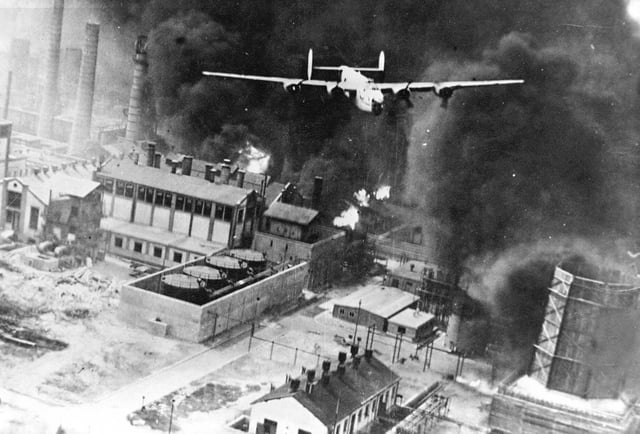 American B-24 Liberator flying over a burning oil refinery at Ploiești, as part of Operation Tidal Wave on 1 August 1943. Due to its role as a significant supplier of oil to the Axis, Romania was a prime target of Allied strategic bombing in 1943 and 1944.