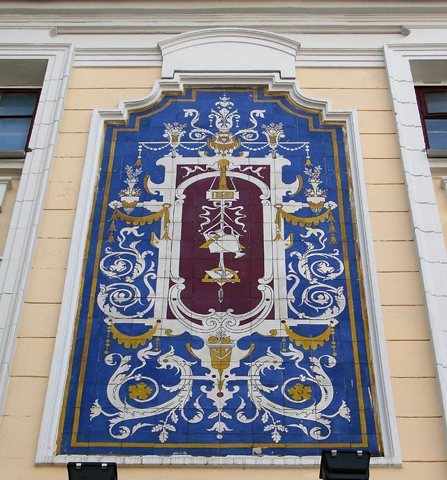 Tiled artwork on the  building.