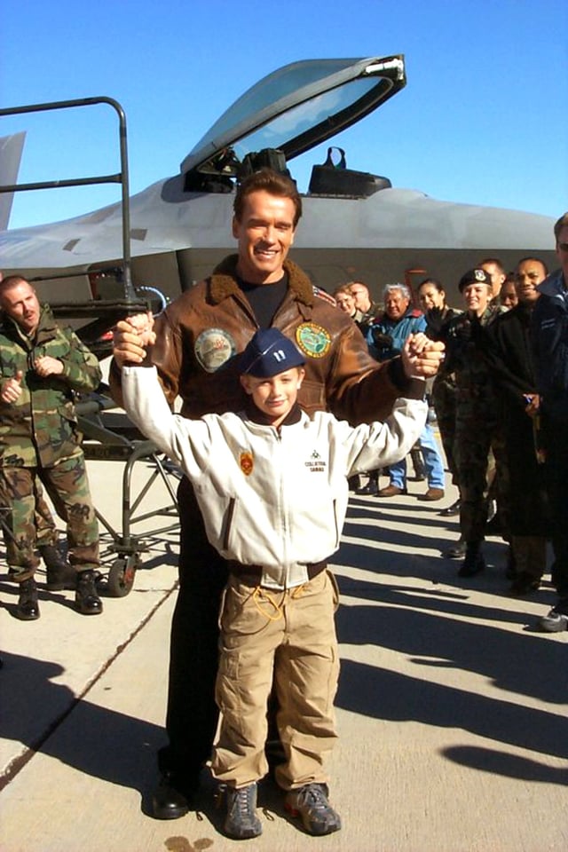 Schwarzenegger and his son Patrick at Edwards Air Force Base in December 2002