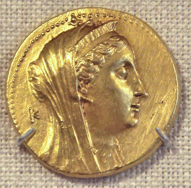 Gold coin with visage of Arsinoe II wearing divine diadem