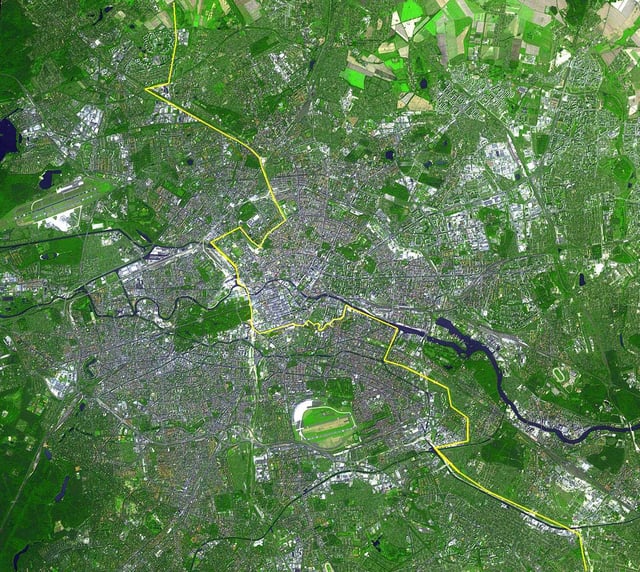 Satellite image of Berlin, with the Wall's location marked in yellow
