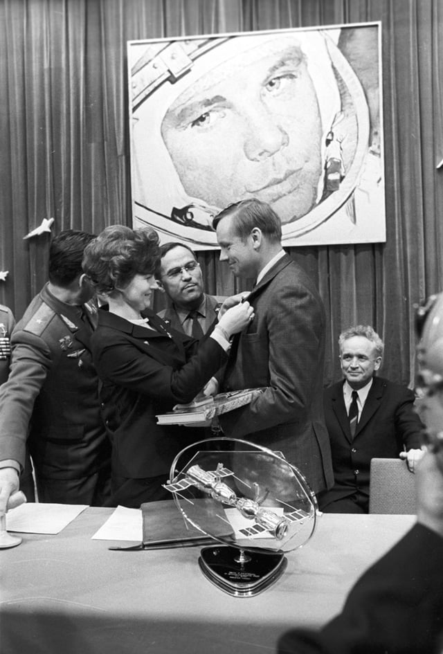 First woman in space, Valentina Tereshkova, presents Armstrong with a badge at his visit to the Yuri Gagarin Cosmonaut Training Center in Star City, June 1, 1970
