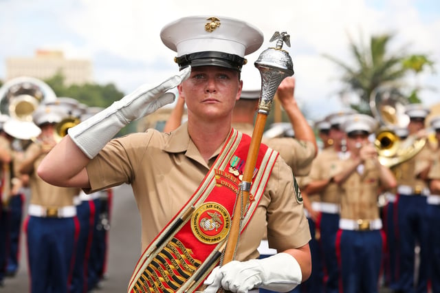 A United States Marine delivers a salute.