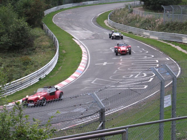 Nordschleife is often open to the public. Three Caterhams are entering Brünnchen, a spectator vantage point.