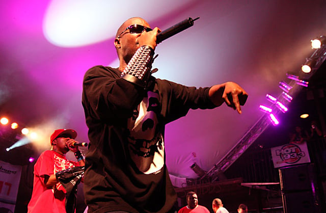 Juicy J (front) and DJ Paul (back) performing