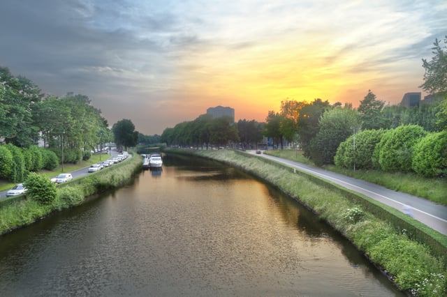 Sunset over the river Leie in Ghent