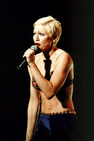 Madonna performing during The Girlie Show World Tour, 1993