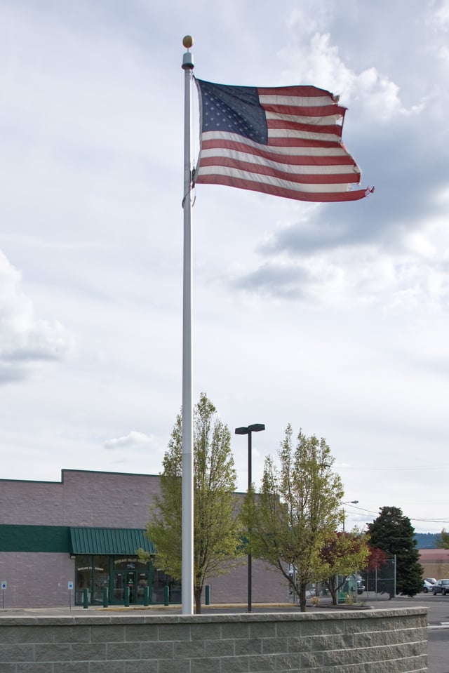 A tattered flag at Spokane Valley Police Headquarters, Spokane, Washington