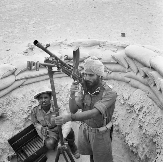 Indian troops manning a Bren light machine gun in an anti-aircraft mount in 1941.