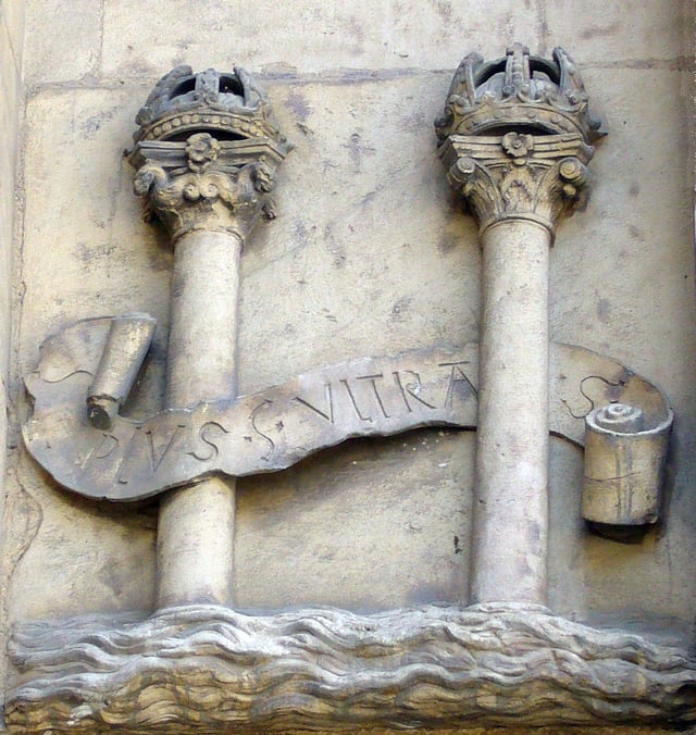 The Pillars of Hercules with the motto "Plus Ultra" ("further beyond") as symbol of the Holy Roman Emperor Charles V in the town hall of Seville (16th century). The Pillars of Hercules were the traditional limits of European exploration into the Atlantic. The most common hypothesis of the origin of the Dollar sign.