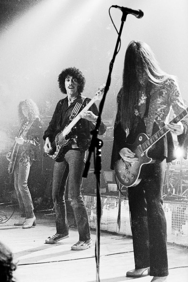 Brian Robertson, Phil Lynott, Scott Gorham of Thin Lizzy performing during the Bad Reputation Tour, November 24, 1977.