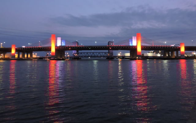 The Pearl Harbor Memorial Bridge, locally known as the Q Bridge, carries ten lanes over the Quinnipiac River along the Connecticut Turnpike.