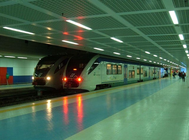 Two trains inside Punta Raisi railway station within Palermo International Airport
