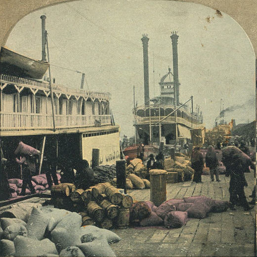 Steamboats bound for inland Alabama and Mississippi being loaded at Mobile's dockyards.