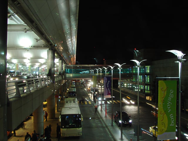 Terminal 2 to the right, the access road, and the parking lot to the left, where the attacks took place
