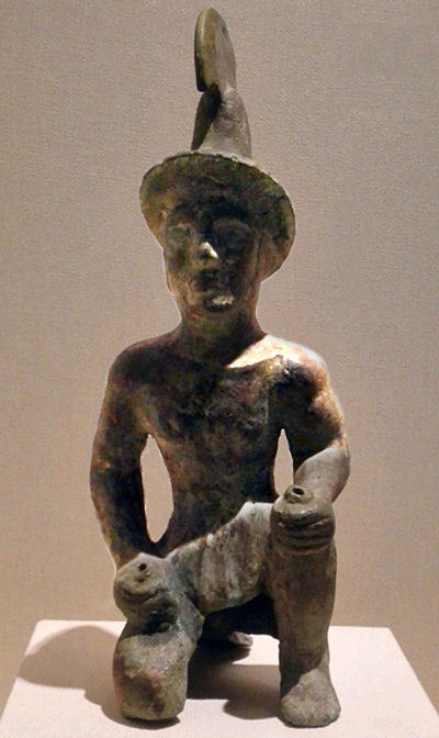 Probable statuette of a Greek soldier, wearing a version of the Greek Phrygian helmet, from a 3rd-century BC burial site north of the Tian Shan, Xinjiang Region Museum, Ürümqi.