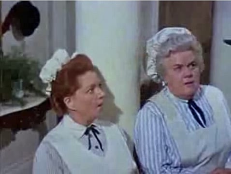Hermione Baddeley and Reta Shaw as Ellen and Mrs. Brill