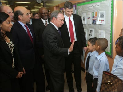 Secretary of Education Arne Duncan and New York City Mayor Michael Bloomberg visit with students at Explore Charter School.