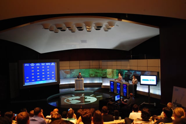 Employees demonstrating IBM Watson capabilities in a Jeopardy! exhibition match on campus, 2011