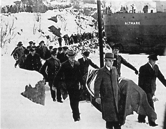 German dead being brought ashore from the German naval tanker Altmark.